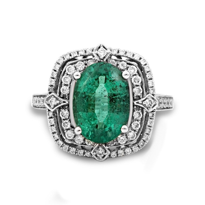 Кольцо из белого золота с бриллиантами и изумрудом (010666)